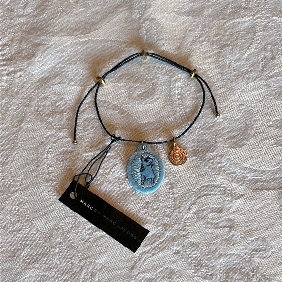 Marc By Marc Jacobs Jewelry - Marc by Marc Jacobs Black Cord Bracelet with Blue and Gold Charms